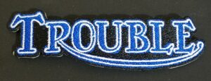 Triumph Trouble Vest Patch: S1398